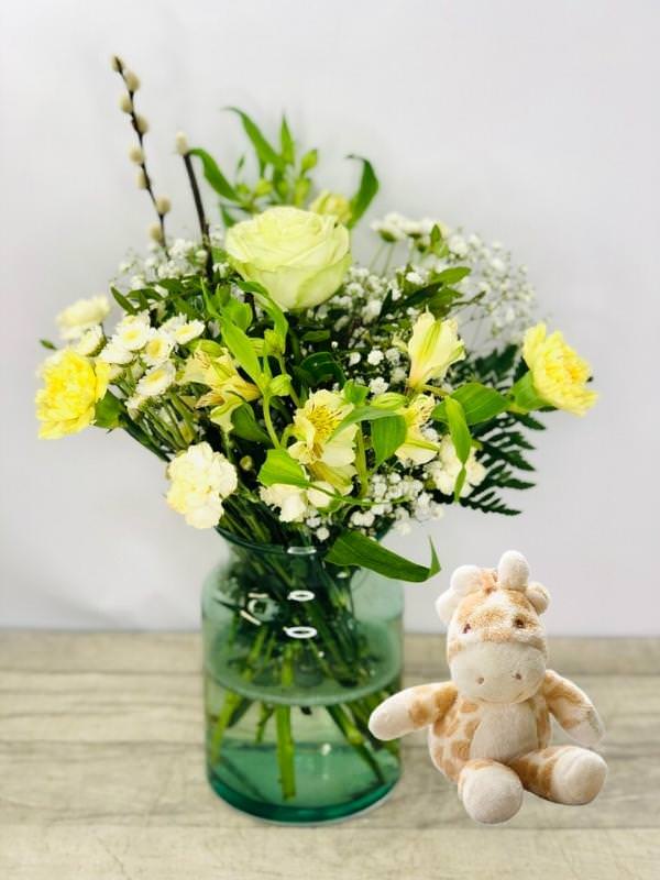 <h2>New Baby Congratulations Vase of Flowers and Giraffe Soft Toy</h2>
<p>These beautiful yellow and white flowers hand-arranged by our professional florists into an eco-friendly glass vase together with a cute Gigi Giraffe Soft Toy are a delightful choice from our new baby collection. This vase contains lots of classic favourites and it would make the perfect gift to celebrate a new baby. </p>
<p>The cute pastel Gigi the Giraffe loves cuddles and comes with a rattle inside to comfort and entertain.  The baby-safe soft toy sits at 6inches.</p>
<h2>Flower Delivery Coverage</h2>
<p>Our shop delivers flowers to the following Liverpool postcodes L1 L2 L3 L4 L5 L6 L7 L8 L11 L12 L13 L14 L15 L16 L17 L18 L19 L24 L25 L26 L27 L36 L70 If your order is for an area outside of these we can organise delivery for you through our network of florists. We will ask them to make as close as possible to the image but because of the difference in stock and sundry items, it may not be exact.</p>
<h2>Vase of Flowers | Flowers in a Vase</h2>
<p></p>
<p>The advantage of having an arrangement made this way is that they are artfully arranged by our florists into the vase so that they stay in the display.</p>
<p>Being delivered in a vase and in water means the recipient does not need to arrange the flowers themselves, they can just put them down and enjoy.</p>
<p>Includes 1 Green Tinted Vase, 1 Green/White Rose, 2 Yellow Alstro, 2 Stallion, 2 Yellow Carnations, 2 Cream spray carnations, 1 Gypsy Grass, and Pussy Willow with mixed seasonal foliage.</p>
<h2>Eco-Friendly Liverpool Florists</h2>
<p>As florists we feel very close earth and want to protect it. Plastic waste is a huge problem in the florist industry so we made the decision to make our packaging eco-friendly.</p>
<p>To achieve this, we worked with our packaging supplier to remove the lamination off our boxes and wrap the tops in an Eco Flowerwrap, which means it easily compostable or can be fully recycled.</p>
<p>Once you've finished enjoying your flowers from us, they will go back into growing more flowers! Only a small amount of plastic is used as a water bubble and this is biodegradable.</p>
<p>Even the sachet of flower food included with your bouquet is compostable.</p>
<p>All our bouquets have small wooden ladybird hidden amongst them, so do not forget to spot the ladybird and post a picture on our social media pages to enter our rolling competition.</p>
<h2>Flowers Guaranteed for 7 Days</h2>
<p>Our 7-day freshness guarantee should give you confidence that we will only send out good quality flowers.</p>
<p>Leave it in our hands we will create a marvellous bouquet which will not only look good on arrival but will continue to delight as the flowers bloom.</p>
<h2>Liverpool Flower Delivery</h2>
<p>We are open 7 days a week and offer advanced booking flower delivery, same-day flower delivery, 3-hour flower delivery. Guaranteed AM PM or Evening Flower Delivery and also offer Sunday Flower Delivery.</p>
<p>Our florists deliver in Liverpool and can provide flowers for you in Liverpool, Merseyside. And through our network of florists can organise flower deliveries for you nationwide.</p>
<h2>The Best Florist in Liverpool, your local Liverpool Flower Shop</h2>
<p>Come to Booker Flowers and Gifts Liverpool for your beautiful flowers and plants. For that bit of extra luxury, we also offer a lovely range of finishing touches, such as wines, champagne, locally crafted Gin and Rum, vases, Scented Candles and Chocolates that can be delivered with your flowers.</p>
<p>To see the full range, see our extras section.</p>
<p>You can trust Booker Flowers and Gifts of delivery the very best for you.</p>
<p><em>5 Star review on Yell.com</em></p>
<p><em>Thank you Gemma for your fabulous service. The flowers are of the highest quality and delivered with a warm smile. My sister was delighted. Ordering was simple and the communications were top-notch. I will definitely use your services again.</em></p>